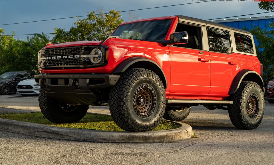 Red Ford Bronco Wildtrak on 37-inch tires