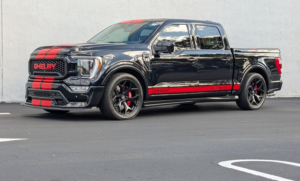 Black Shelby F-150 with red stripes