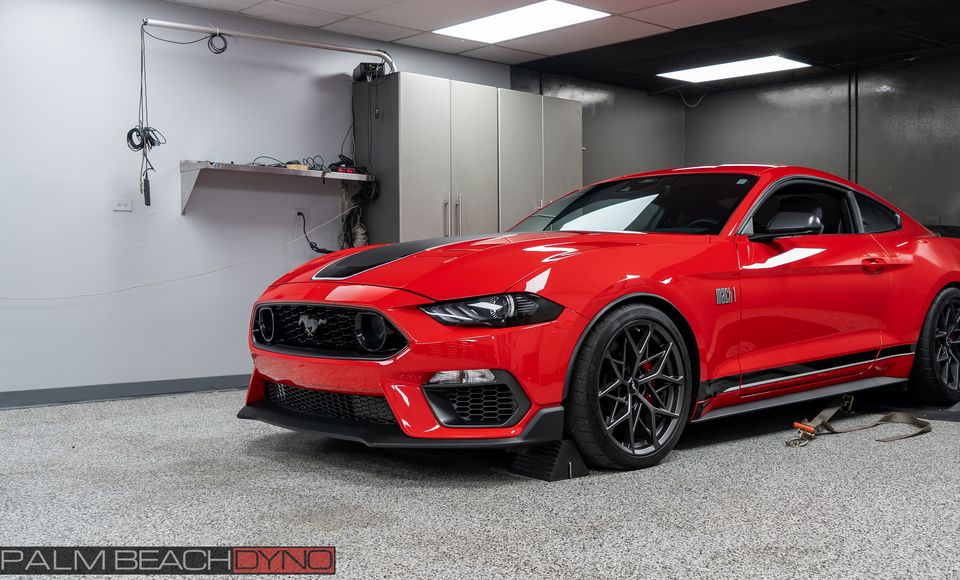 Red Mustang Mach 1 with a Whipple 3.0L supercharger in the Palm Beach Dyno shop
